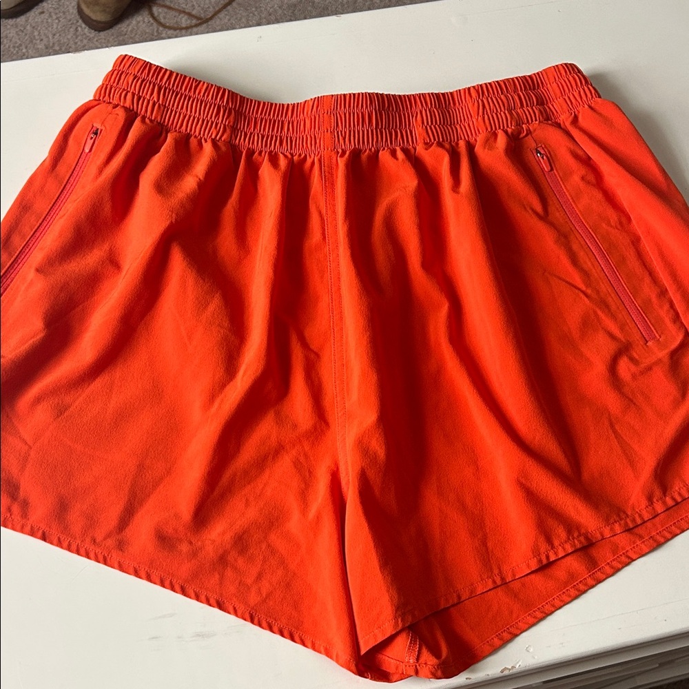 Outdoor Voices Bright Orange Athletic Shorts with Zipper Pockets